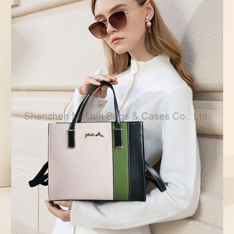 The modern fashion trend is simple, light and luxurious. Women's commuting color hand bill shoulder oblique straddle bag