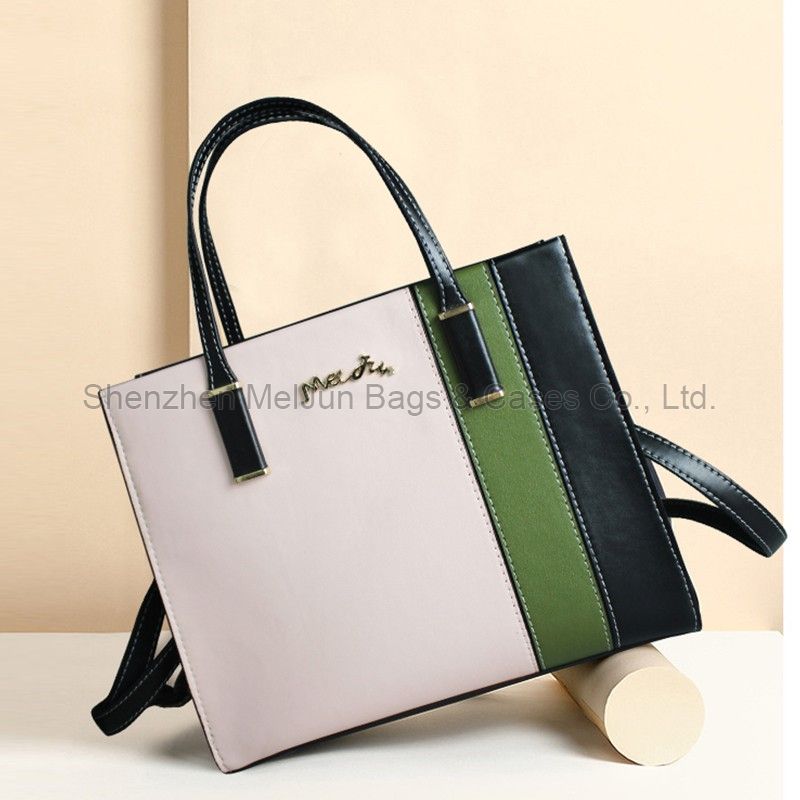 The modern fashion trend is simple, light and luxurious. Women's commuting color hand bill shoulder oblique straddle bag