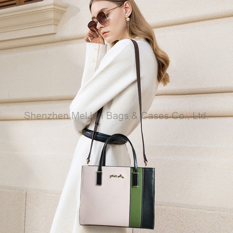 The modern fashion trend is simple, light and luxurious. Women's commuting color hand bill shoulder oblique straddle bag